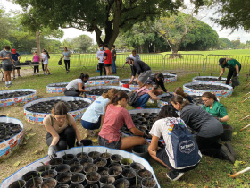 A group of volunteers who planted the mangrove pups. (Photo by Grace Carricarte)